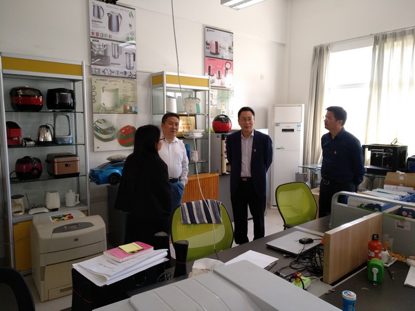 1521618411925656.jpg 报道21.jpg